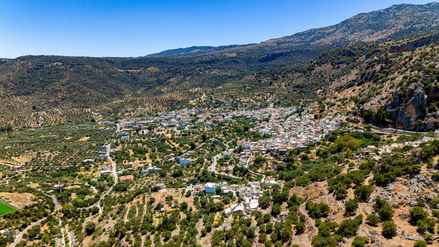 Aerial drone view of Kritsa village and olive groves in Crete, Greece