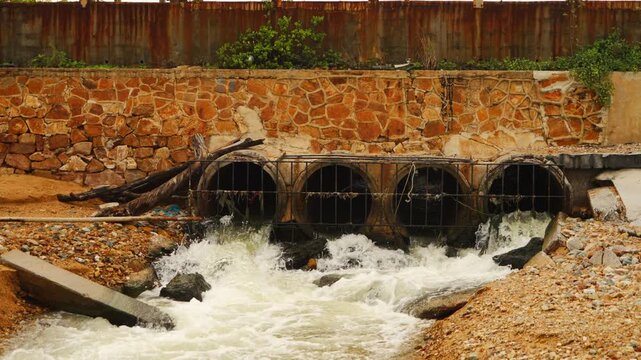 Cooling water from industrial water tanks is used for wastewater treatment and discharged into pipes that flow into the sea and streams, eventually passing along the beach.
