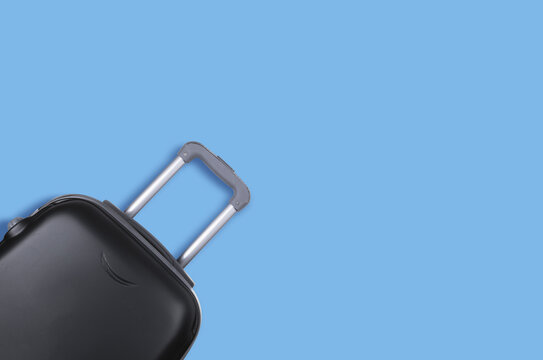 travelling suitcase, travel luggage on a blue background