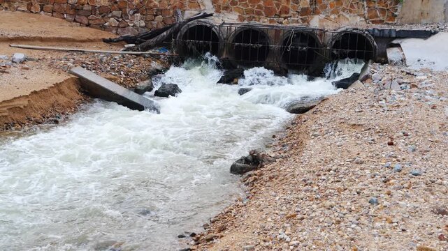 Cooling water from industrial water tanks is used for wastewater treatment and discharged into pipes that flow into the sea and streams, eventually passing along the beach.
