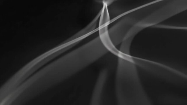 Soft abstract light patterns in monochrome style on dark background, concept of gentle motion and calm serenity