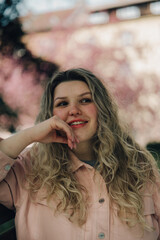 Naklejka premium Young woman portrait outdoors in spring light, natural beauty and soft tones, lifestyle concept in Czech Republic, Europe, commercial use