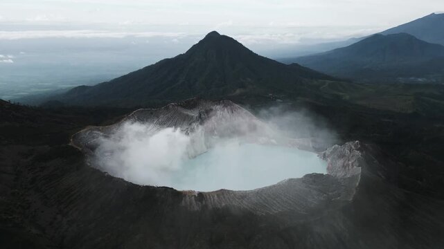 Aerial View of Ijen Volcano Crater Lake with Sulfur Gas Fuming from the Volcanic Landscape