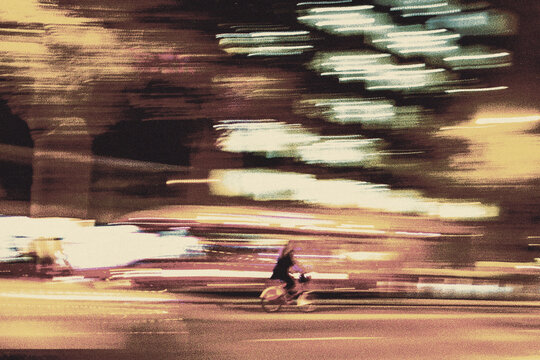 man riding a bike in the city on the road motion blur speed vintage postcard print
