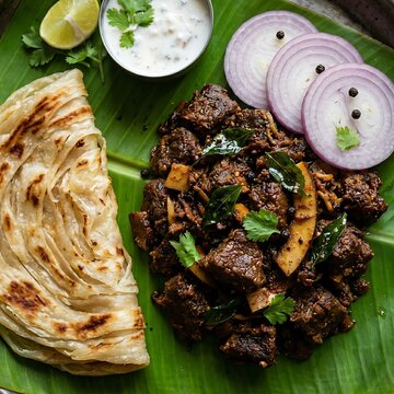 Spicy Beef Fry with Parotta and Onion Rings