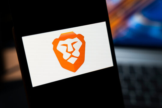 Warsaw, Poland - May 13, 2026: Close-up view of a smartphone displaying the logo of a popular web browser application featuring a stylized lion's head, representing technology and modern digital solu