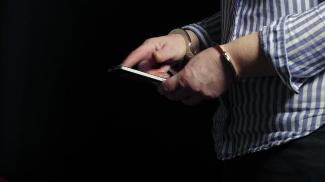 Woman mindless scrolling mobile cellphone dark background
