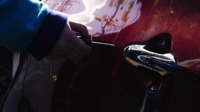 Driver unlocking and opening car door