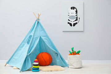 Wigwam, toys and picture in child's room © New Africa