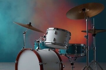 Obraz premium Drum set positioned on gradient studio background lighting