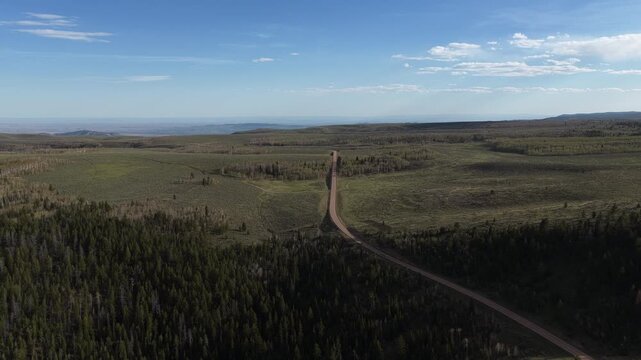 Aerial above US Highway 191 through Ashley National Forest in northeast Utah Uinta Mountains