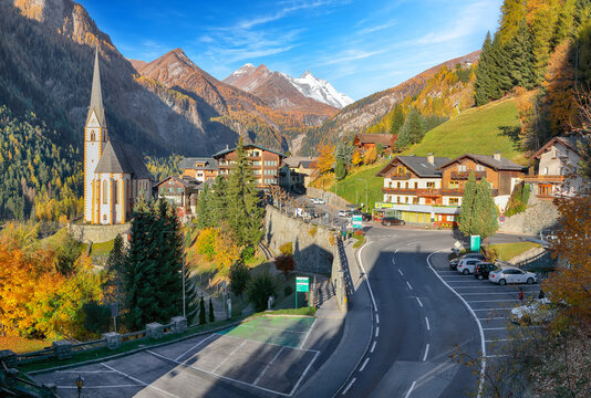 Amazing autumn landscape  at Heiligenblut with St Vincent Church near Grossglockner mount .