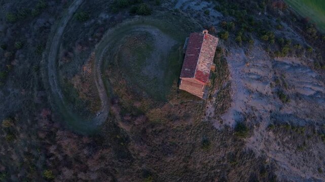 Aerial view from a drone of the hermitage of the Virgin of Pueyo in the vicinity of the village of Bini&eacute;s in the La Jacetania region. Pyrenees. Huesca. Aragon. Spain. Europe.