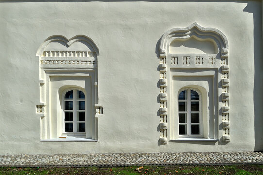 Ancient windows in the buildings of Treasury, abbot and cellarer cells XVII-XIX centuries of St.Anthony monastery in Veliky Novgorod, Russia