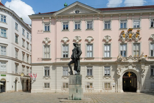 Historic Vienna square with statue and ornate facade