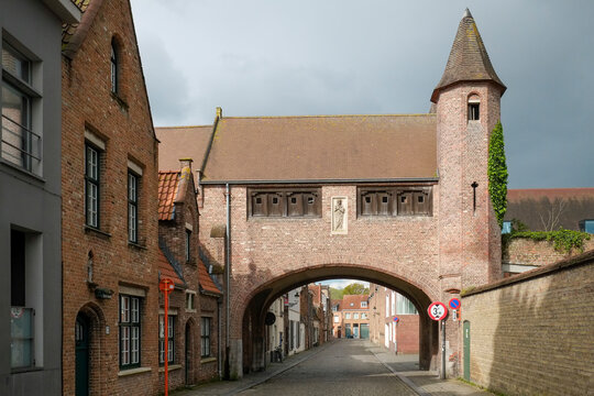Brick archway on a quiet historic street