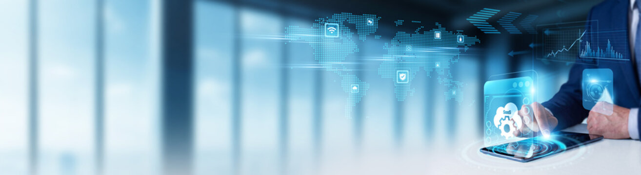 Businessman using digital tablet to monitor SaaS and global software as a service data cloud subscriptions, application uptime, user licensing, and web-based platform growth.