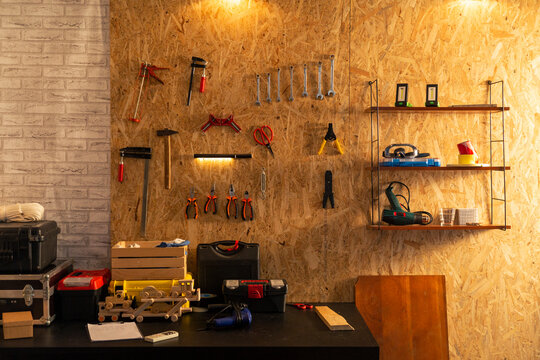 Organized workshop wall with tools and equipment for diy projects