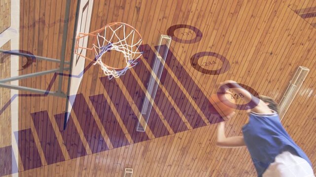 Male player entering right, jumping and dunking in sports drill, purple chart obscuring him and rim