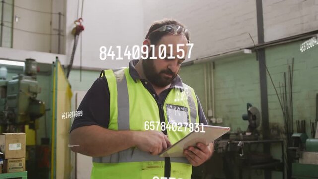 Supervisor tapping tablet, checking production data on plant as numeric overlays updating on tablet