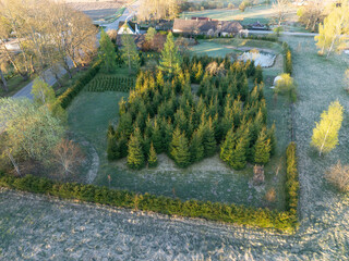 A spruce hedge around the property. Aerial photo. © Kaspars