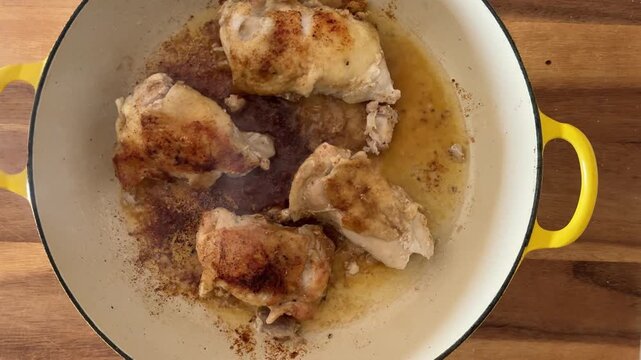 Frying Chicken Thights in a Frying Pan