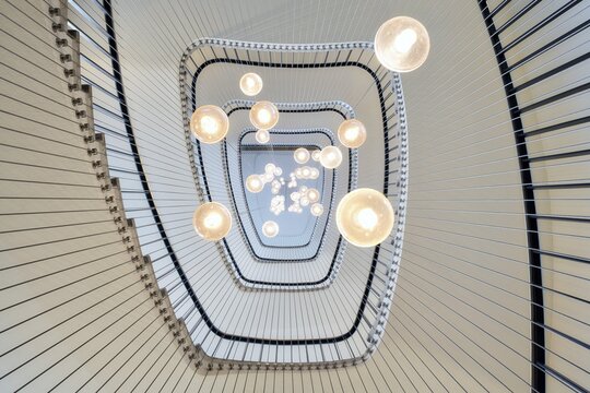Modern staircase in an office building with a view from below, Zurich, Switzerland
