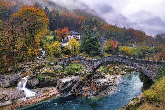 Stone bridge Ponte dei Salti near Lavertezzo on a rainy autumn day, Verzasca Valley, Canton Ticino, Switzerland