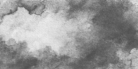 A striking black and gray watercolor wash painting creates an organic cloud like texture and visual effect. capturing abstract shapes, forms, and patterns.  © jaduuu