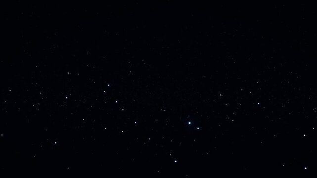 Night star field time lapse, deep black sky with scattered white stars. Minimal cosmic background for astronomy and space themes