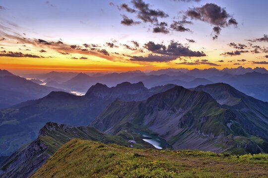 View from Brienzer Rothorn on Central Swiss Alps, cloudy atmosphere at dawn, Canton Bern, Canton Obwaden, Switzerland