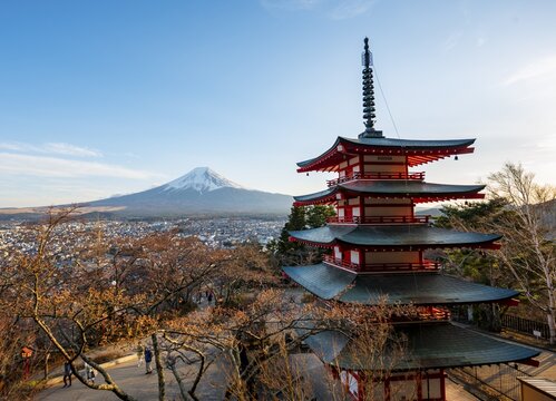 Five-story pagoda of a Shinto Shrine, Chureito Pagoda, with views of Fujiyoshida City and Mount Fuji volcano at sunset, Arakura Fuji Sengen Shrine, Arakurayama Sengen Park, Yamanashi Prefecture, Japan