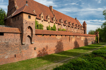 Fototapeta premium Malbork Castle, on the banks of the Nogat River. Malbork, Poland