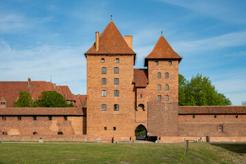 Obraz premium Malbork Castle, on the banks of the Nogat River. Malbork, Poland