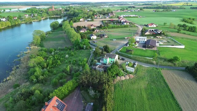 Drone Shot of Lake Shore with Trees and Farmland &ndash; 4K ProRes