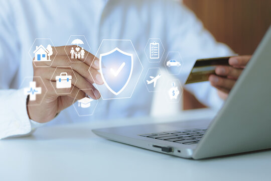 Person holding credit card with insurance icons for health, life, and property. Concept of financial protection, employee benefits, healthcare coverage, and diverse insurance policies