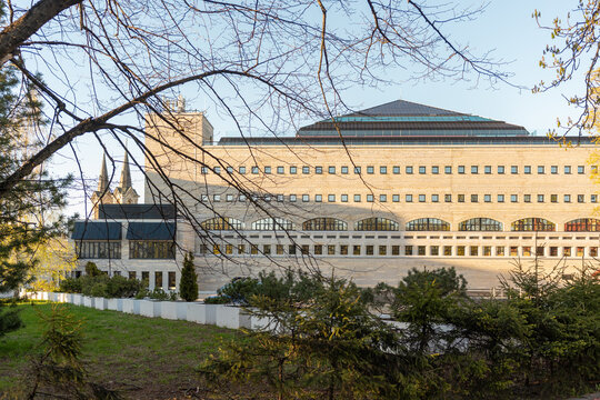 National library of Estonia building in Tallinn seen through trees