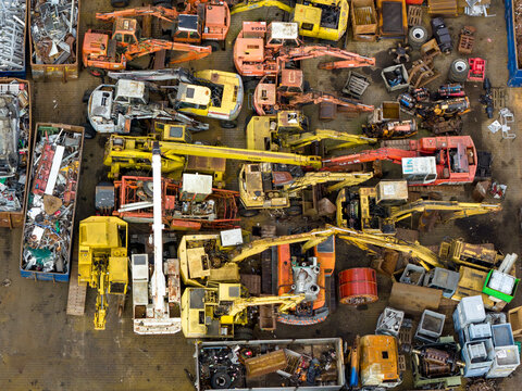 Aerial view of scrapped cars and crushed metal debris piled in a junkyard and recycling site in Hoogeveen, Drenthe, Netherlands.