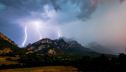 Fototapeta premium storm clouds over the mountains