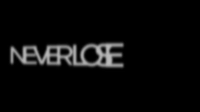 Typography with the words never lose appears in a white blurred font against a solid black background.