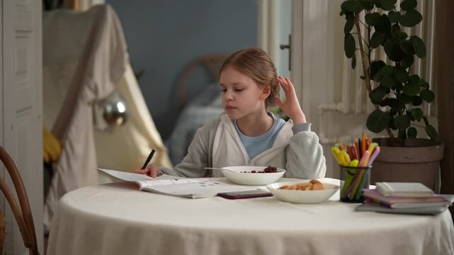 White girl sorting homework papers calmly bowl and pencils on table, flipping pages and arranging notes, preparing assignment with steady attention, independent .