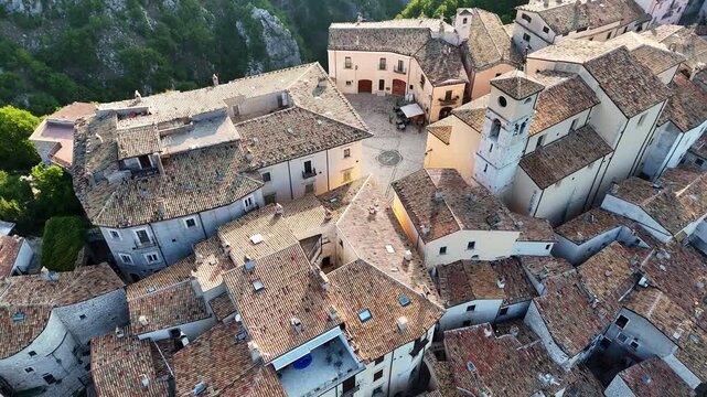 Experience the charm of terracotta rooftops in a quaint hillside village surrounded by nature's beauty