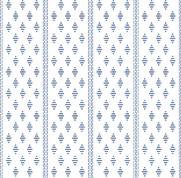 Blue and white geometric dobby weave pattern with repetitive diamond shapes and vertical borders.