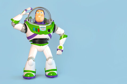 Buzz Lightyear action figure character from the Toy Story movie Disney Pixar saga and space for text. Illustrative editorial