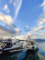 Fototapeta premium beautiful ships and boats are moored near the shore