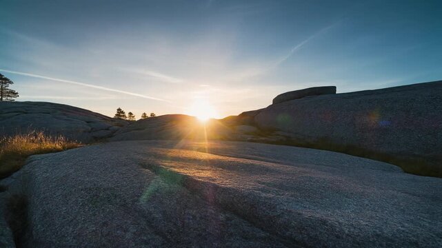 Sunset over rocky granite landscape on the Bohuslan coast of Sweden