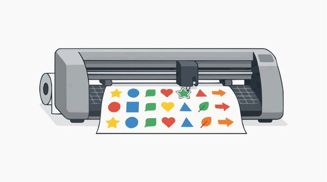 Cutting plotter machine cutting colorful shapes and icons from paper or vinyl