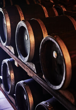 Wooden barrels are typically used for aging wine, spirits like bourbon or whiskey, or traditional balsamic vinegar.