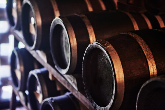 Wooden barrels are typically used for aging wine, spirits like bourbon or whiskey, or traditional balsamic vinegar.