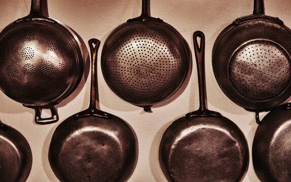 Antique French metal strainers and colanders